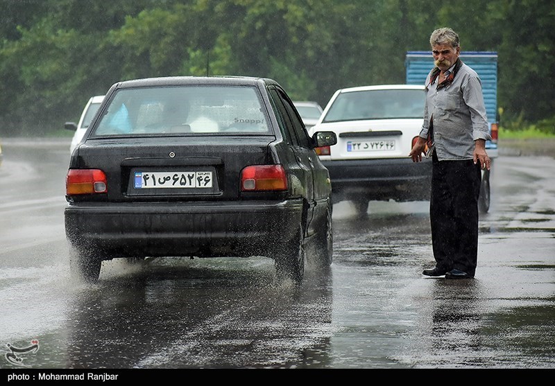 باران تابستانی در رشت/ گزارش تصویری