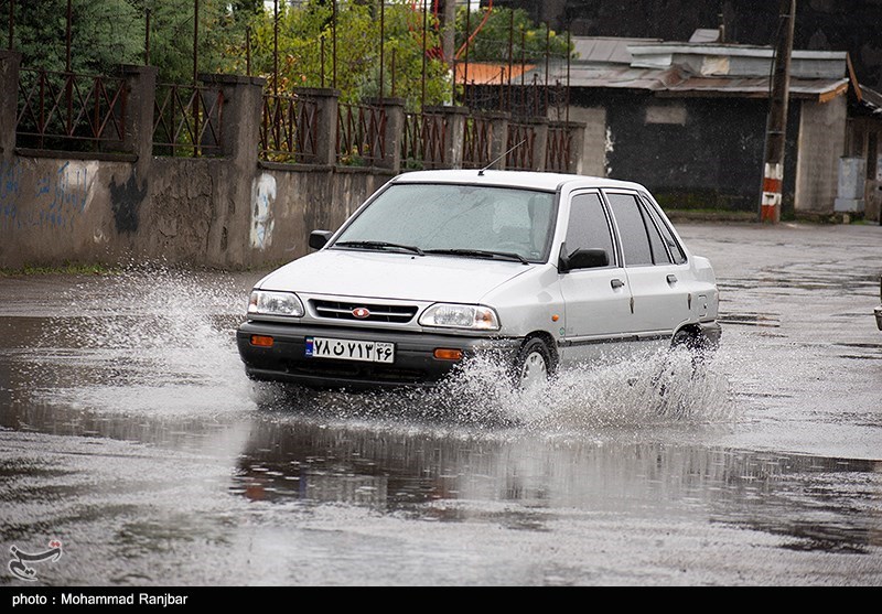 باران تابستانی در رشت/ گزارش تصویری