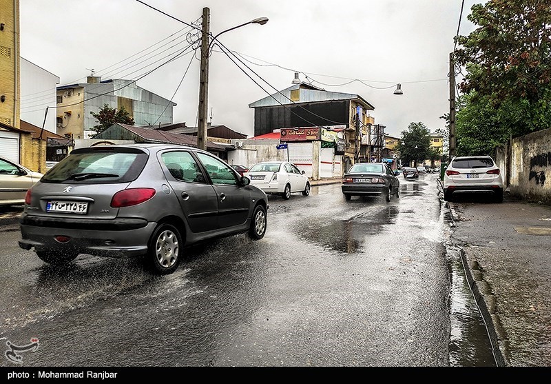 باران تابستانی در رشت/ گزارش تصویری