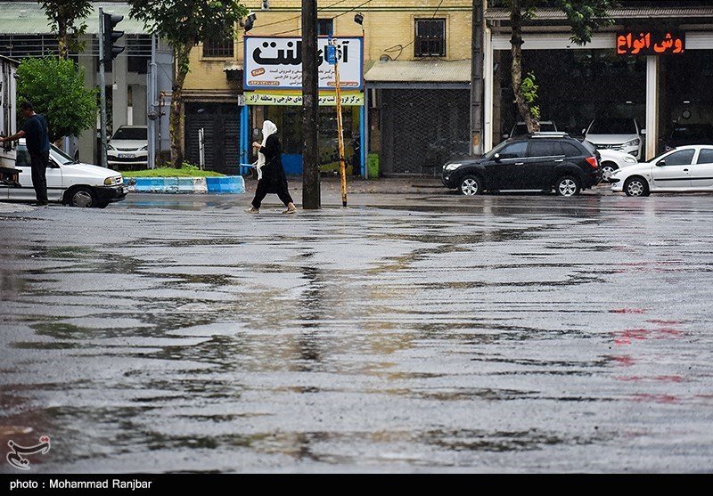 باران تابستانی در رشت/ گزارش تصویری