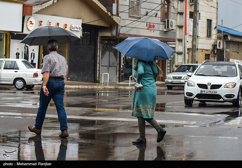 باران تابستانی در رشت/ گزارش تصویری