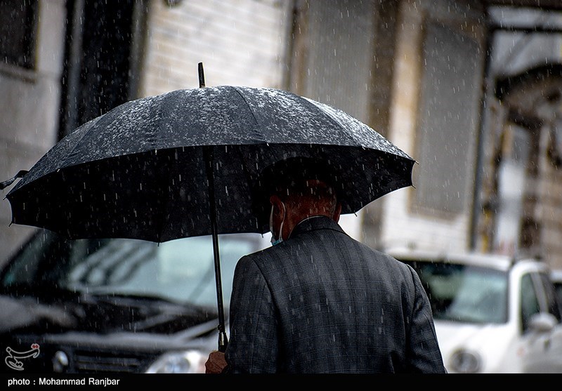 باران تابستانی در رشت/ گزارش تصویری